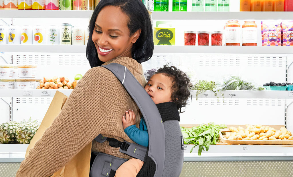 shopping with baby in a light weight baby carrier