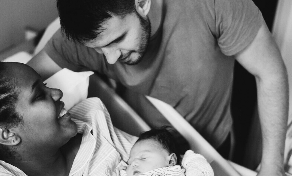 Mum and Dad with newborn baby