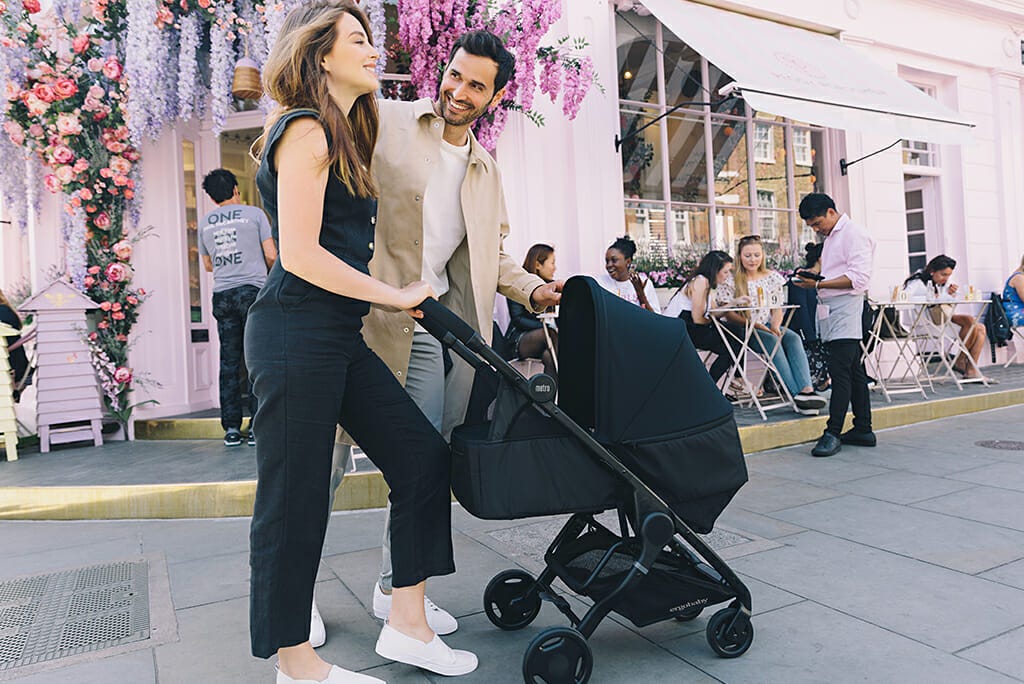 A compact stroller that can fold with a carry cot still attached!