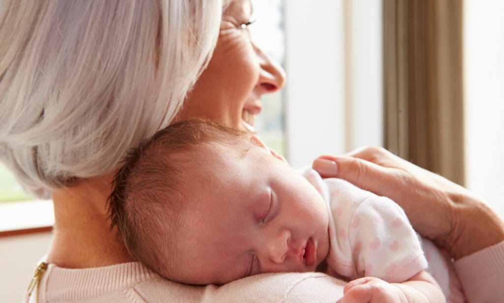 grandmother and a newborn baby